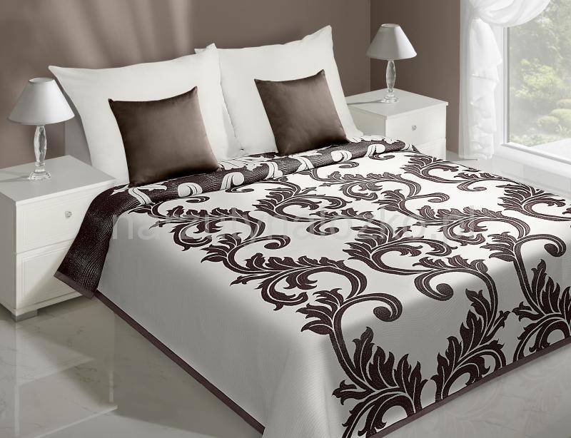 Dwustronna narzuta koloru kremowego do sypialni na łóżko z brązowym ornamentem