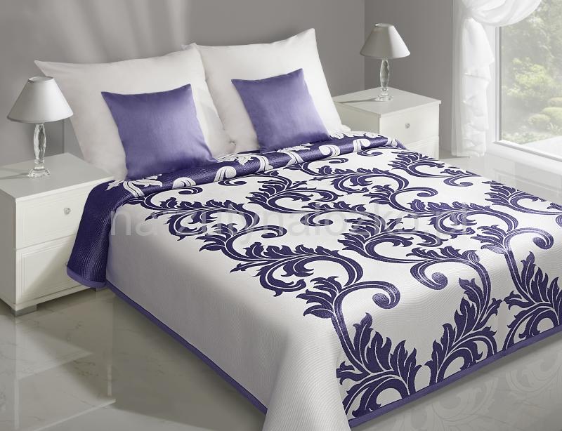 Kremowe narzuty dwustronne na łóżko z fioletowym ornamentem