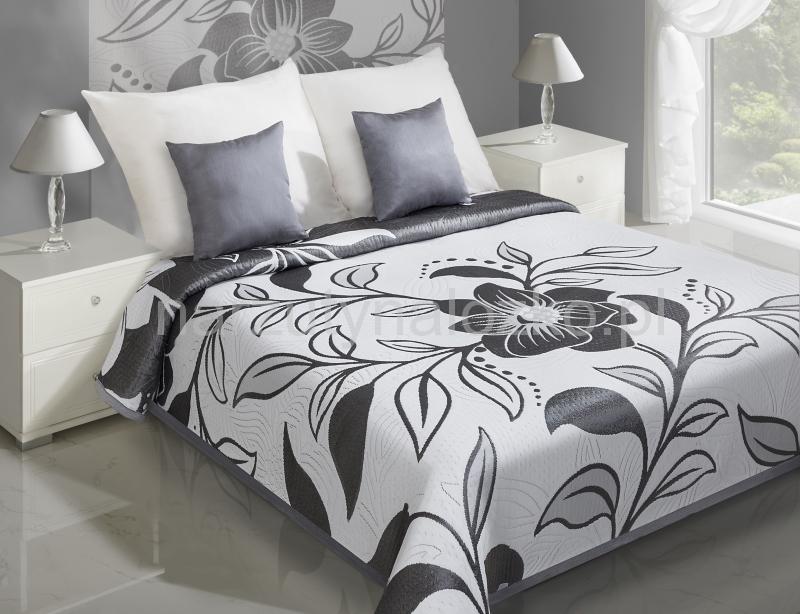 Białe narzuty dwustronne na łóżko w szare kwiaty