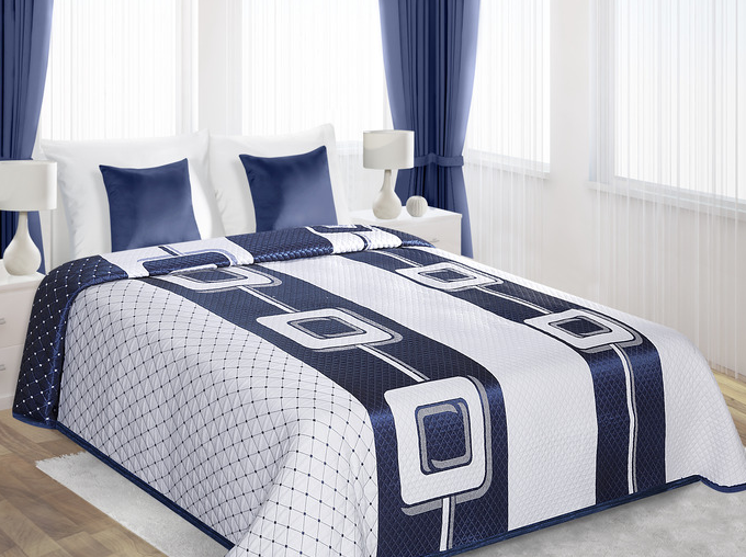 Granatowe wzory narzuty dwustronne w kolorze białym na łóżko