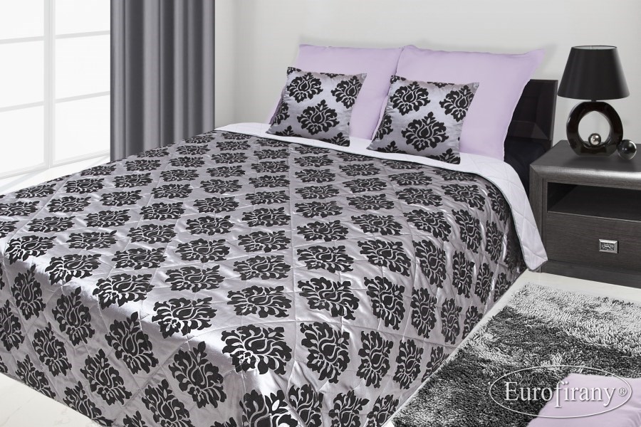 Stalowe narzuty pikowane na łóżka z czarnym wzorem