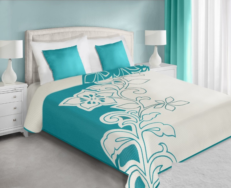 Dwustronne narzuty i kapy na łóżko w kolorze biało turkusowym