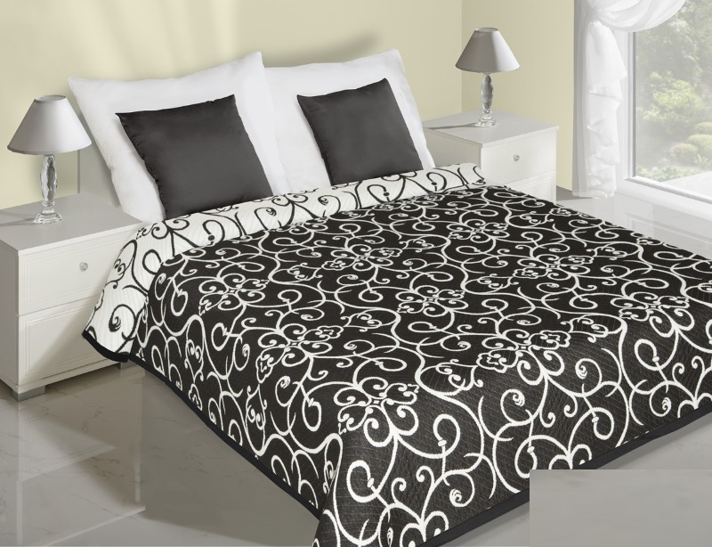 Czarna narzuta dwustronna na łóżko z białymi liściami