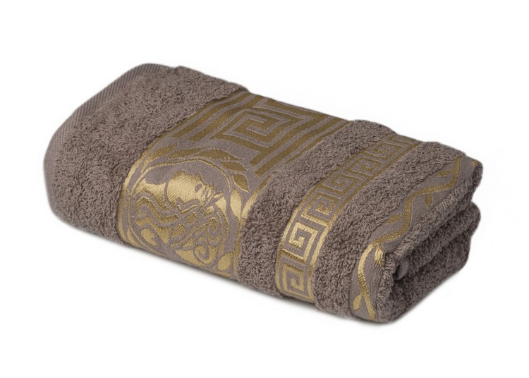 Brązowy ręcznik bawełniany w ozdobne śliskie wzory