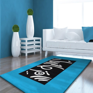 Bardzo ładny turkusowy dywan do pokoju w delikatne wzory